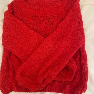 Jun and Ivy Francescas collection red sweater.